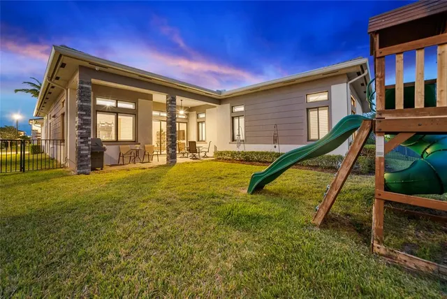 a view of an house with a swimming pool
