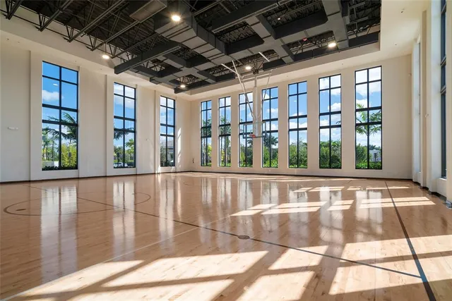 a kitchen with stainless steel appliances granite countertop a stove and a sink