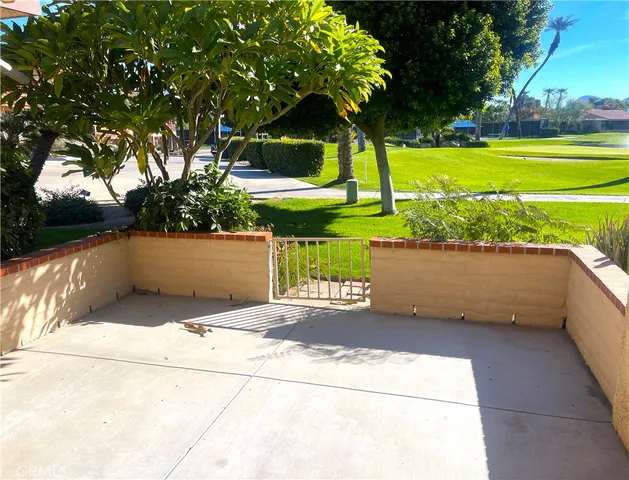 a view of a garden with an outdoor space