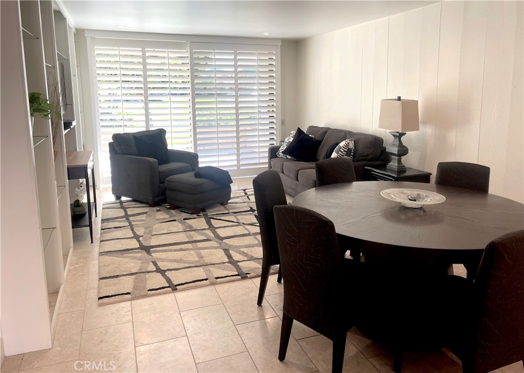 23 Sunrise Drive Rancho Mirage, CA 92270 - Photo 2 of 17 a living room with furniture and a window