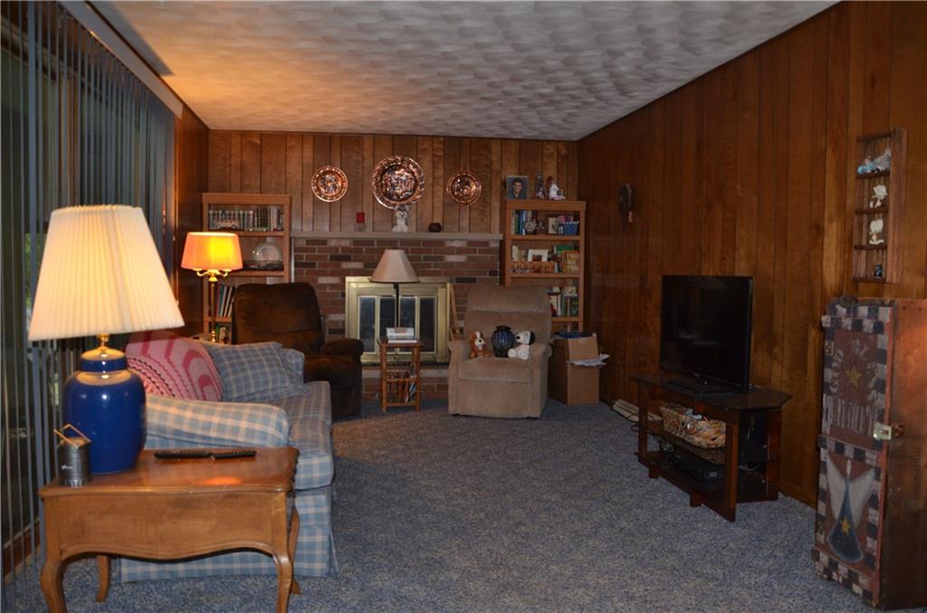 2345 Valley View Road Hermitage, PA 16148 - Photo 16 of 23 Family room. This room has a sliding glass door to enclosed patio. It's accessed from Kitchen and attached 2 car garage.