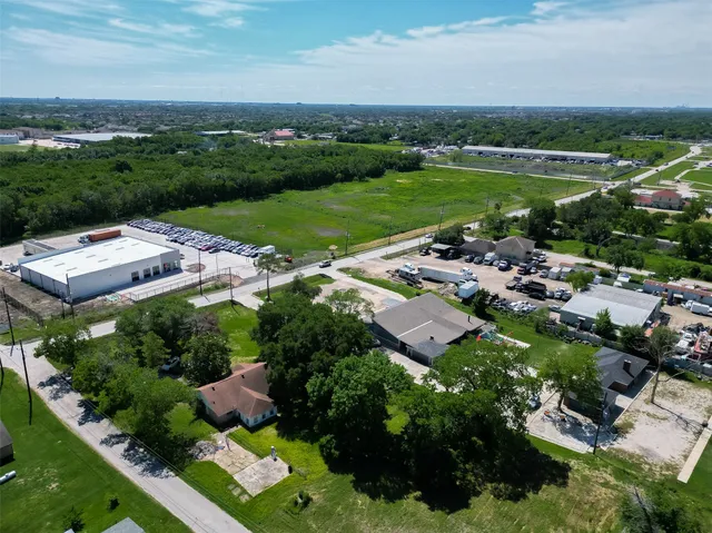 an aerial view of a house with a garden
