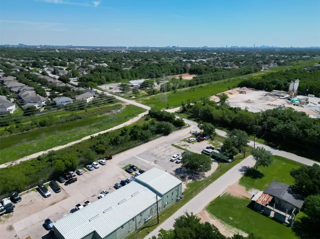 an aerial view of a city with lots of residential buildings
