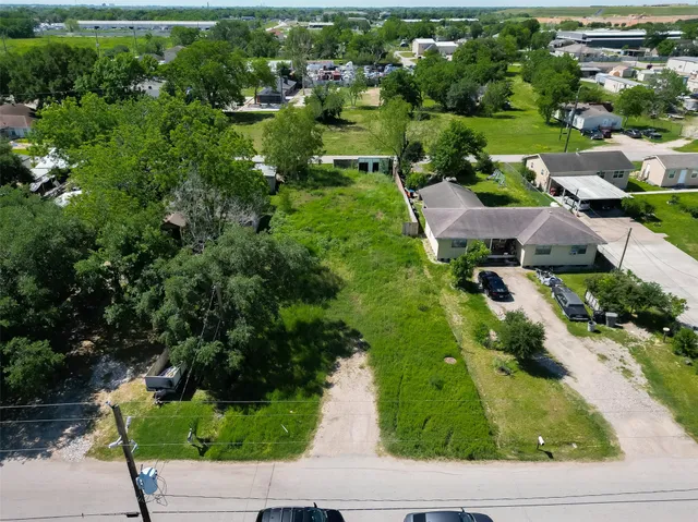 a view of a garden with swimming pool
