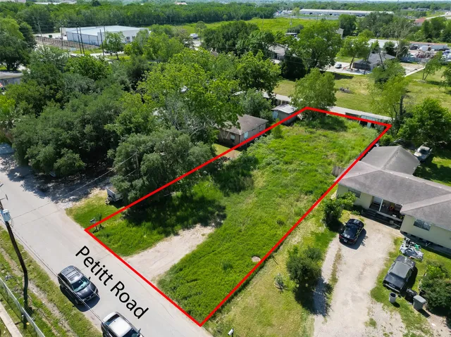 an aerial view of a house with a garden