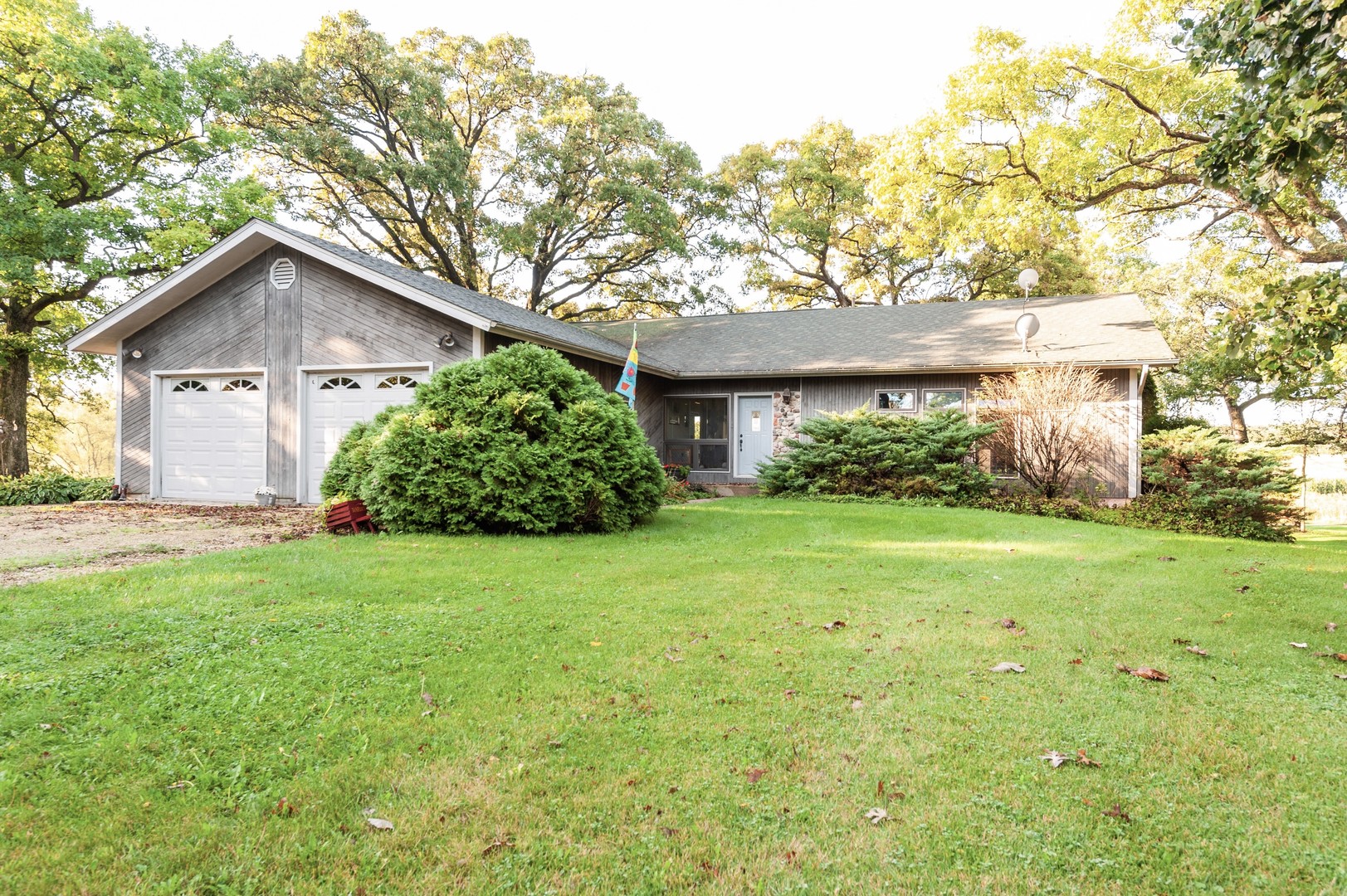 18315 Lincoln Road Harvard, IL 60033 - Photo 16 of 31 a view of a house with yard and a garden