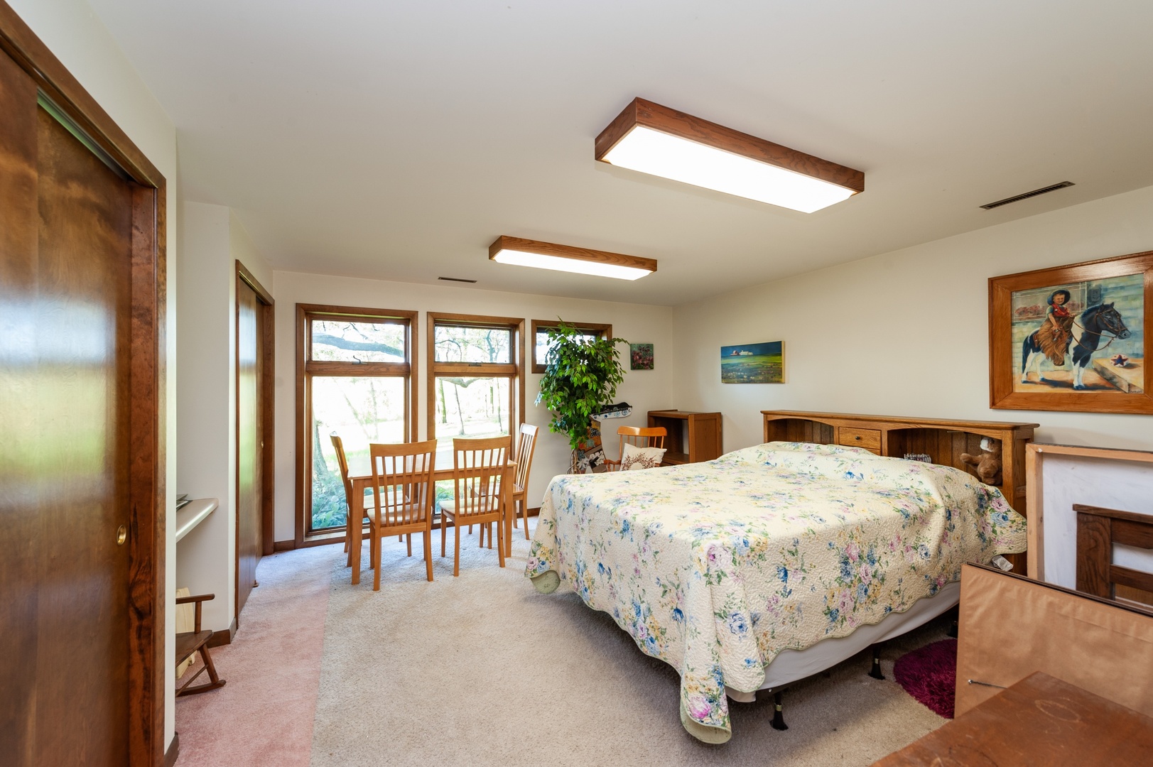 18315 Lincoln Road Harvard, IL 60033 - Photo 21 of 31 a bed sitting in a spacious bedroom next to a window