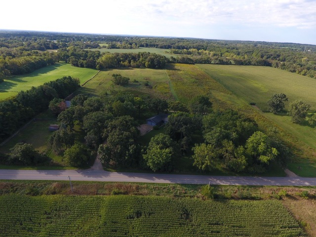 18315 Lincoln Road Harvard, IL 60033 - Photo 7 of 31 an aerial view of residential houses with outdoor space and river