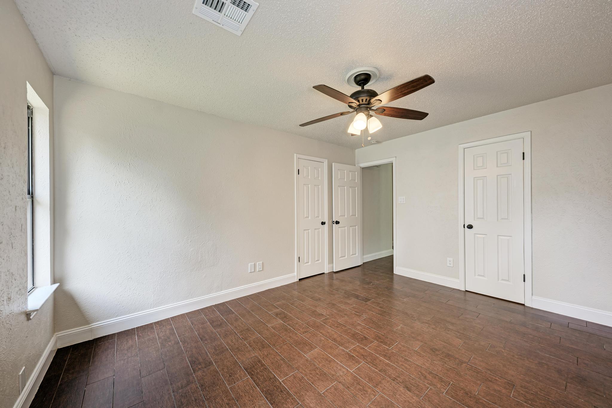 12108 Carnforth Drive Austin, TX 78753 - Photo 19 of 33 a view of an empty room with a window
