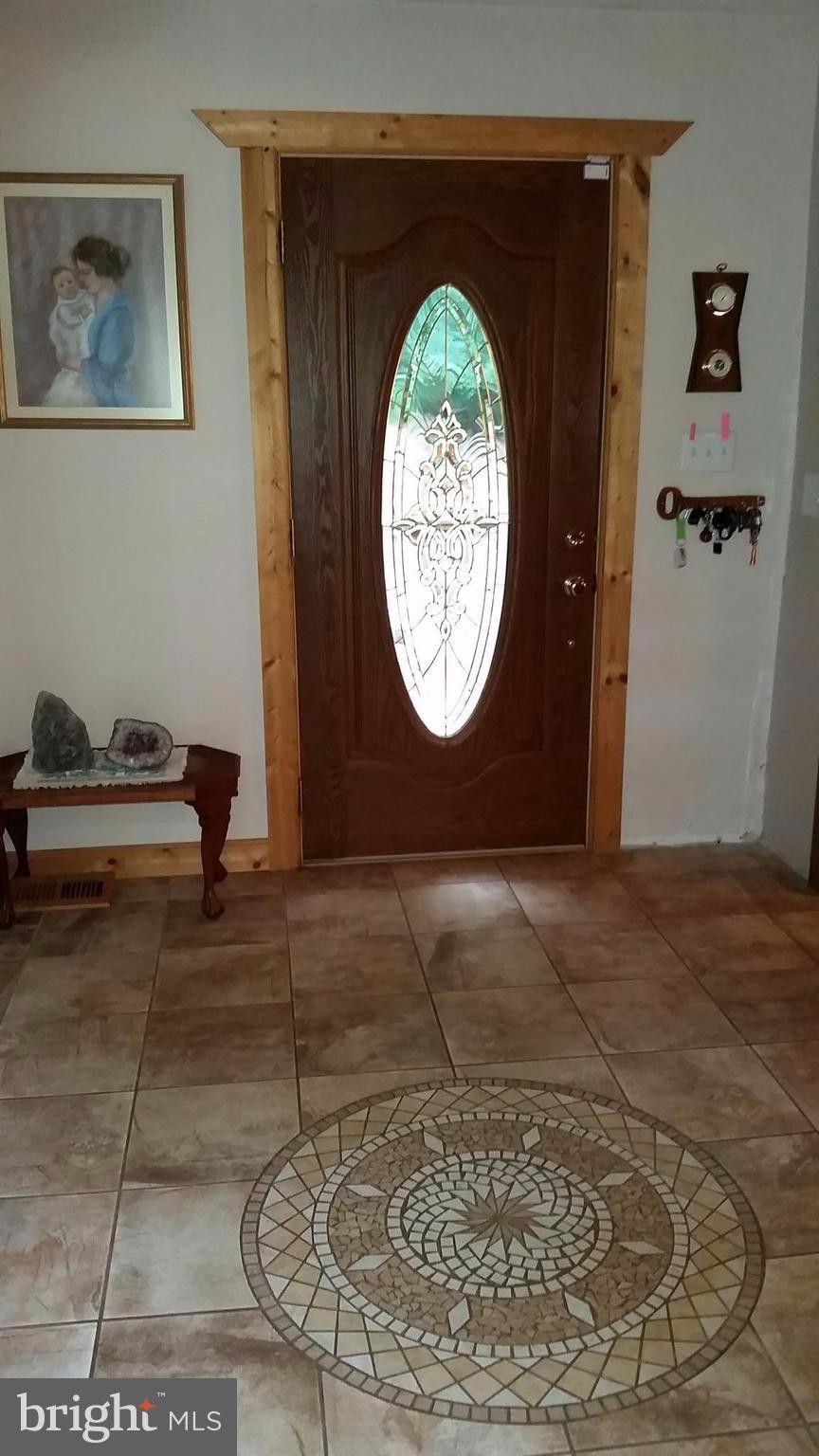 75 Marsden Heights Road Linden, VA 22642 - Photo 3 of 30 Foyer with ceramic tile floor.
