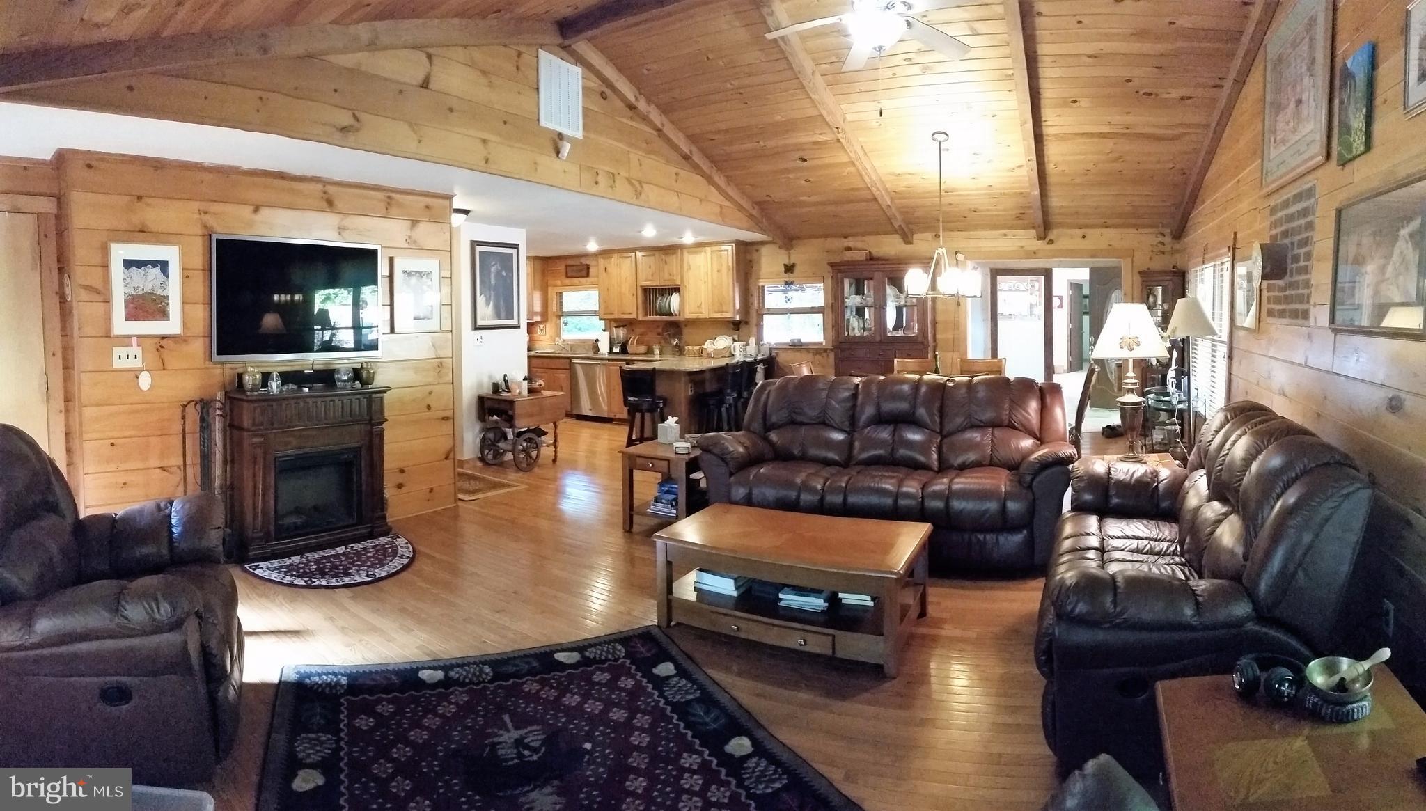 75 Marsden Heights Road Linden, VA 22642 - Photo 4 of 30 Great Room with log walls.