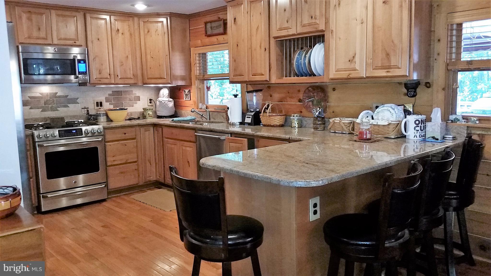 75 Marsden Heights Road Linden, VA 22642 - Photo 7 of 30 Granite counters and under cabinet lighting