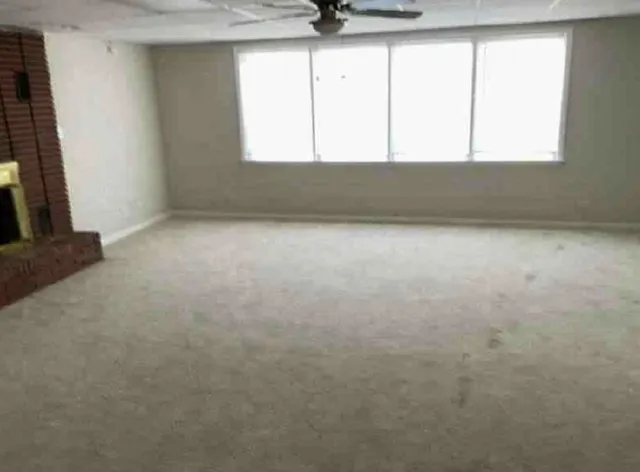 an empty room with a window