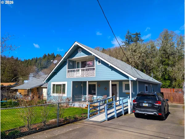 a car parked in front of a house