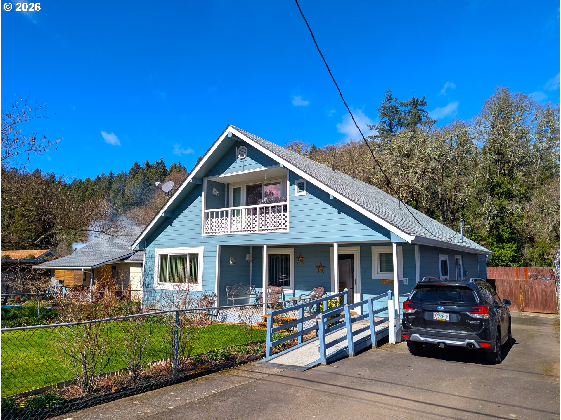48379 7th Street Oakridge, OR 97463 - Photo 1 of 5 a car parked in front of a house