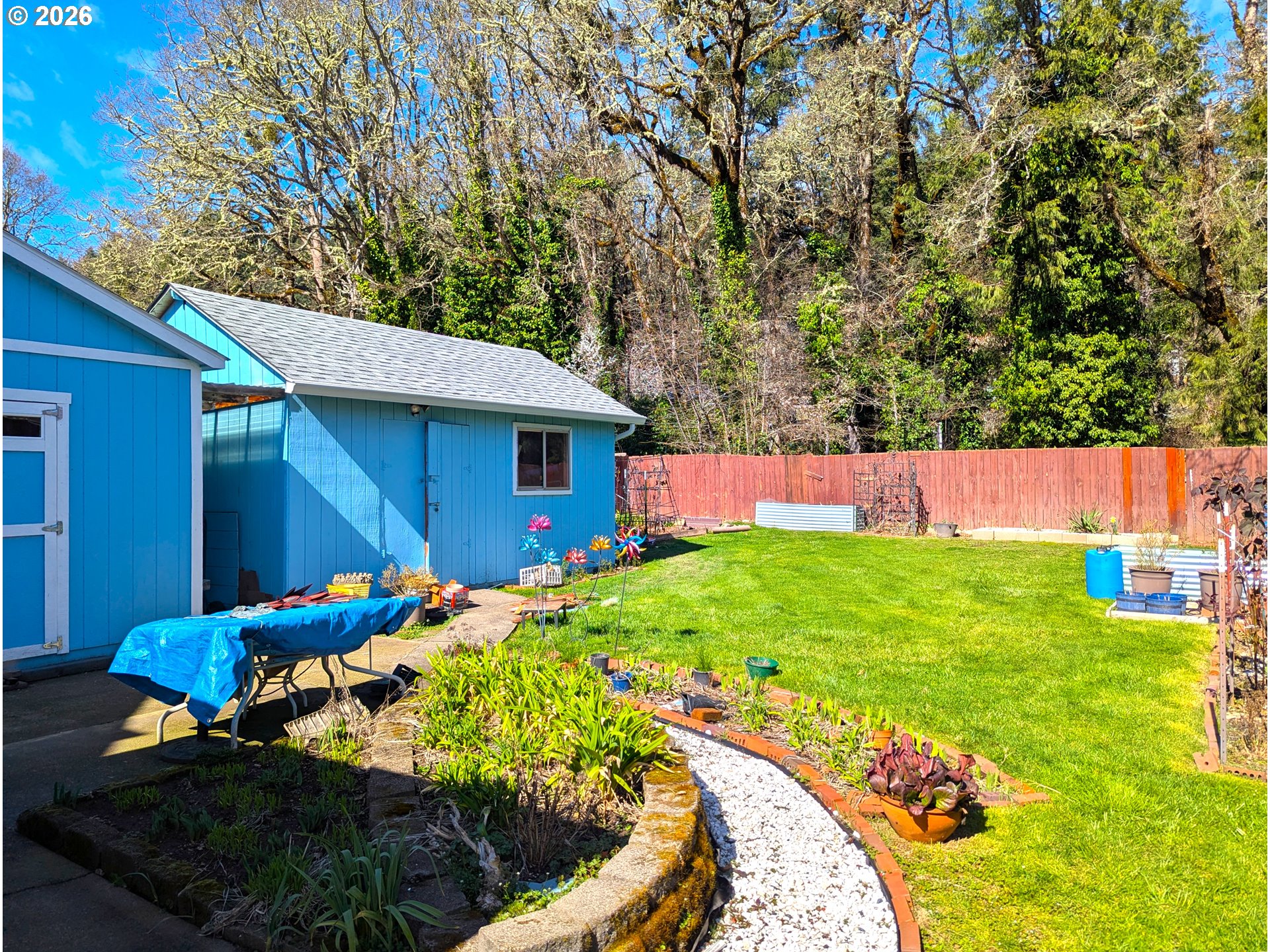 48379 7th Street Oakridge, OR 97463 - Photo 4 of 5 a view of backyard with seating area and green space