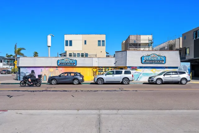 a view of a street with cars