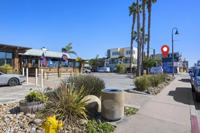 a view of a street with sitting area