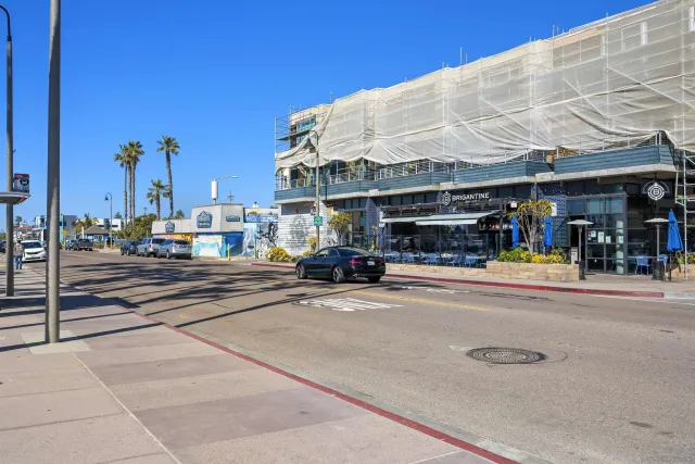 a view of street with shops