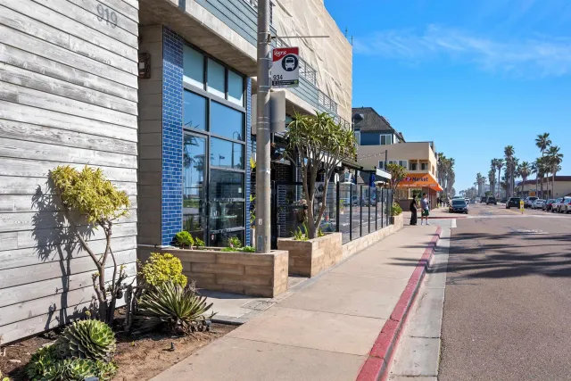 a view of a street with sitting area
