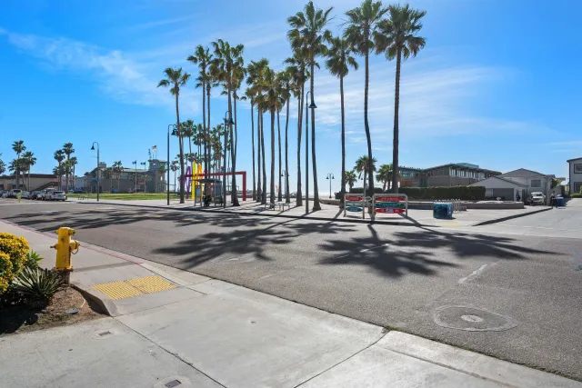 a view of a city with palm trees