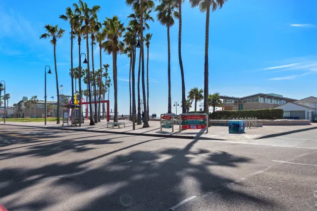 a view of a park with swings and slides