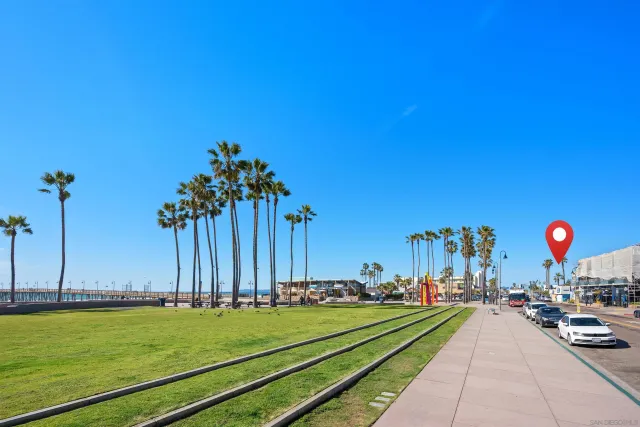a group of cars parked in front of house