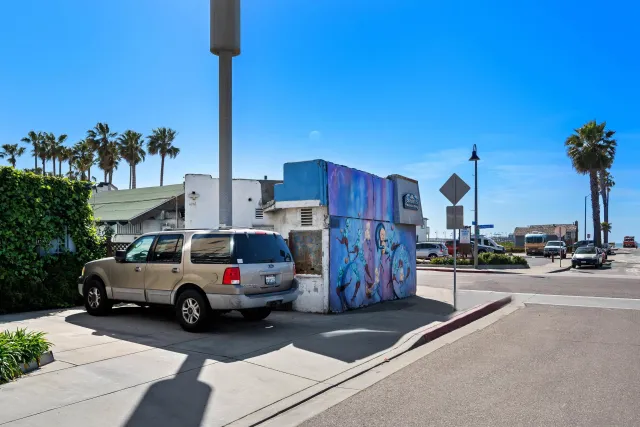 a view of a street with cars