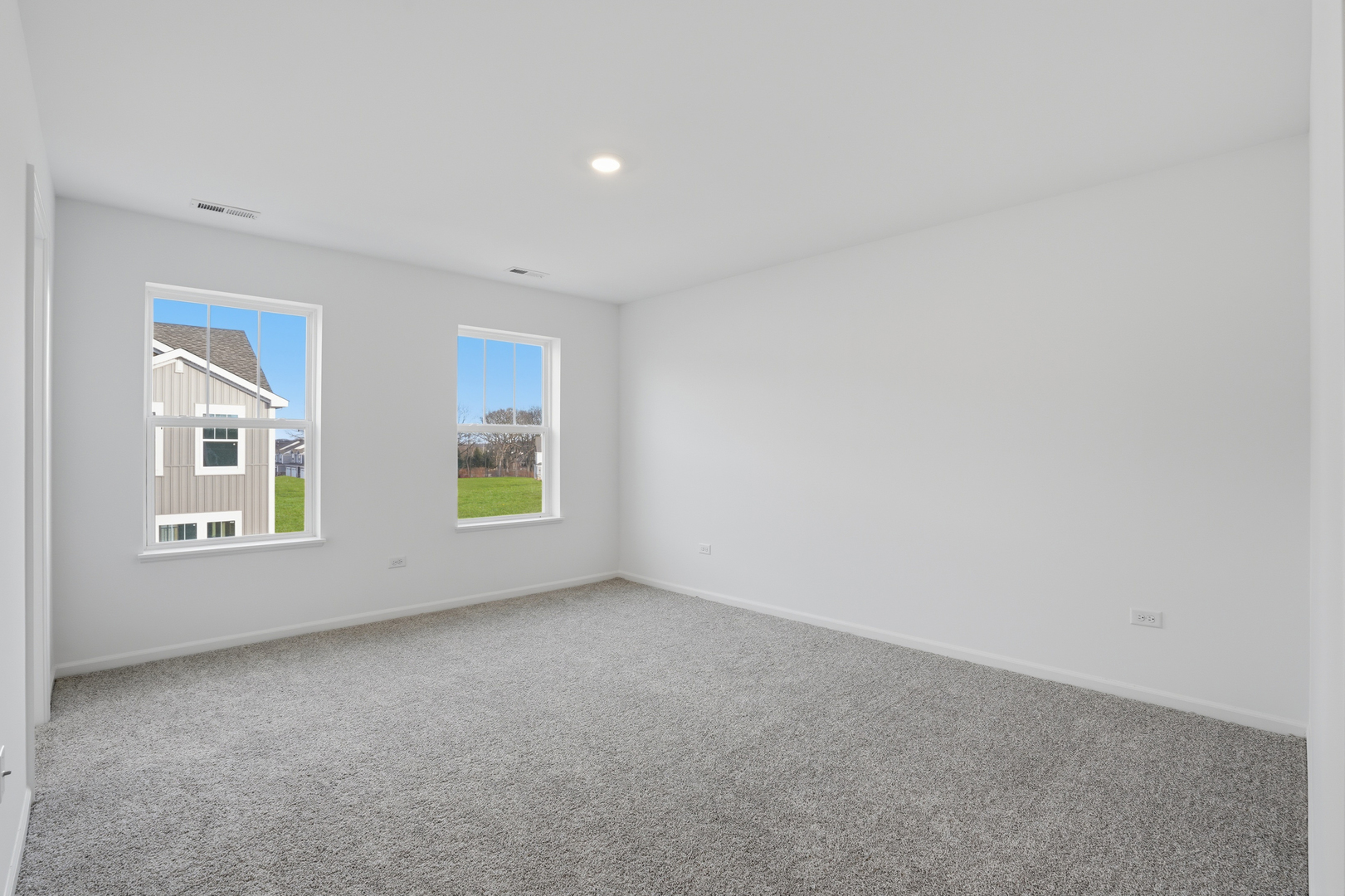 402 Red Oak Circle Volo, IL 60020 - Photo 12 of 20 an empty room with windows