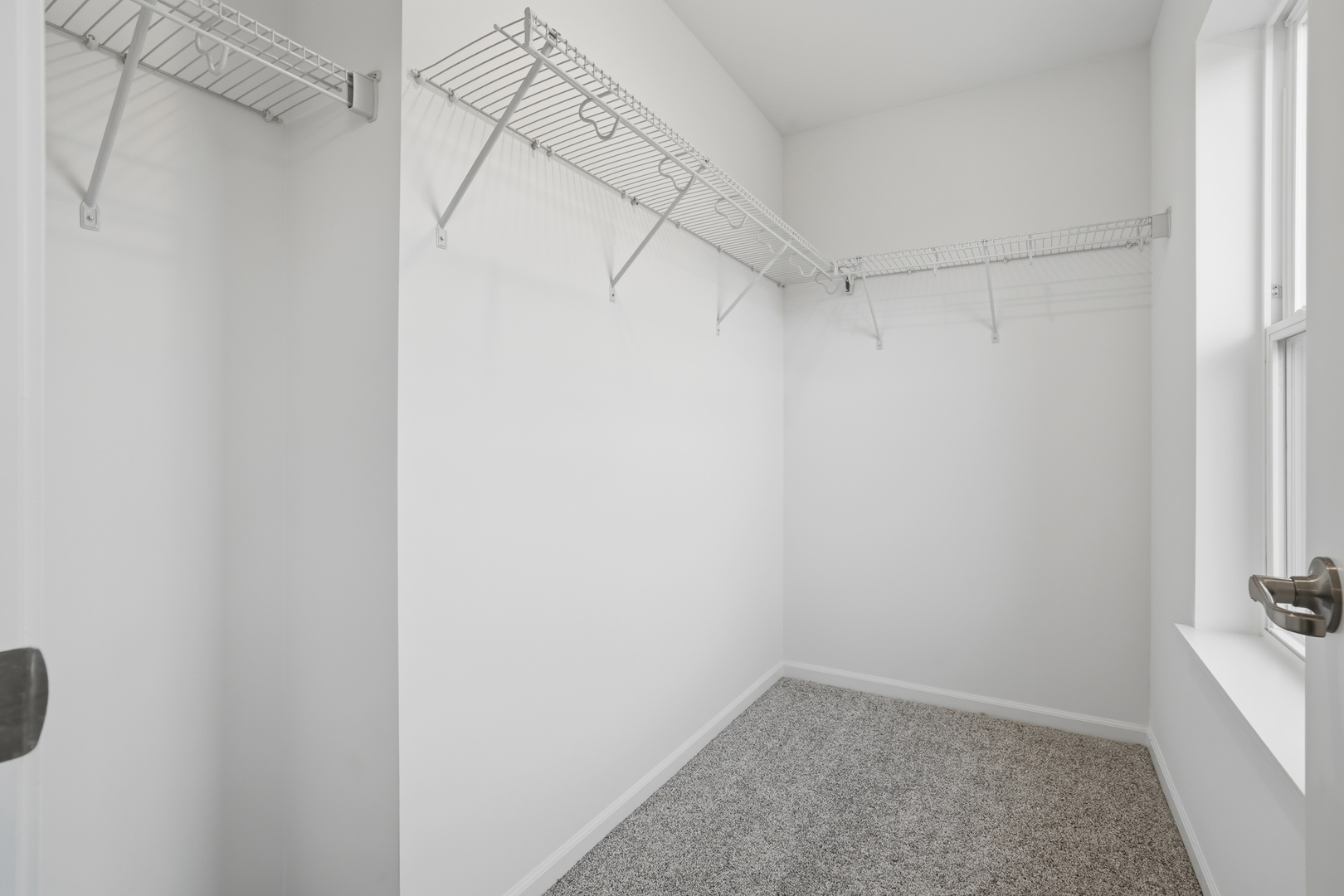 402 Red Oak Circle Volo, IL 60020 - Photo 13 of 20 a view of a room with racks on the wall