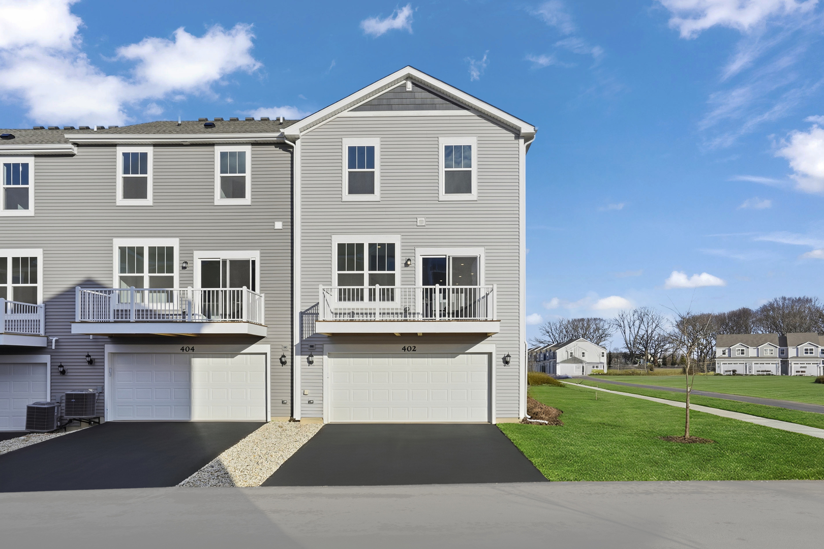 402 Red Oak Circle Volo, IL 60020 - Photo 2 of 20 a front view of a house with garden