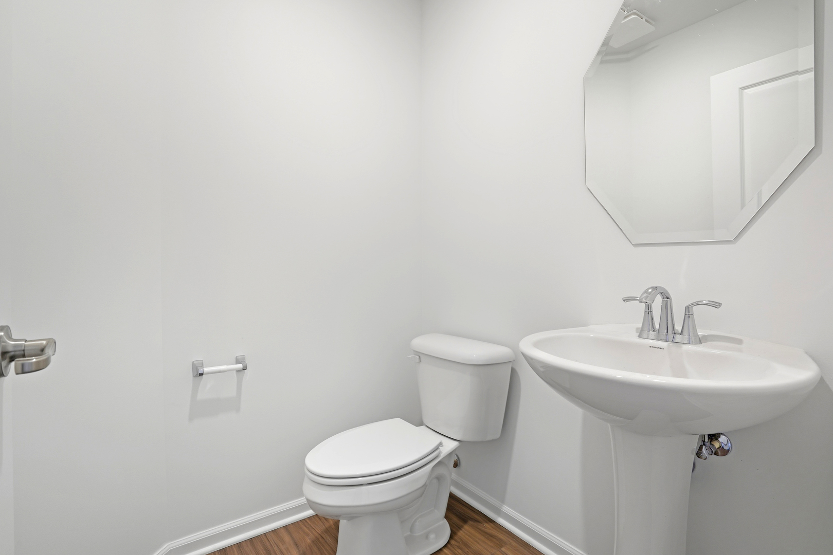 402 Red Oak Circle Volo, IL 60020 - Photo 10 of 20 a white toilet sitting next to a white sink