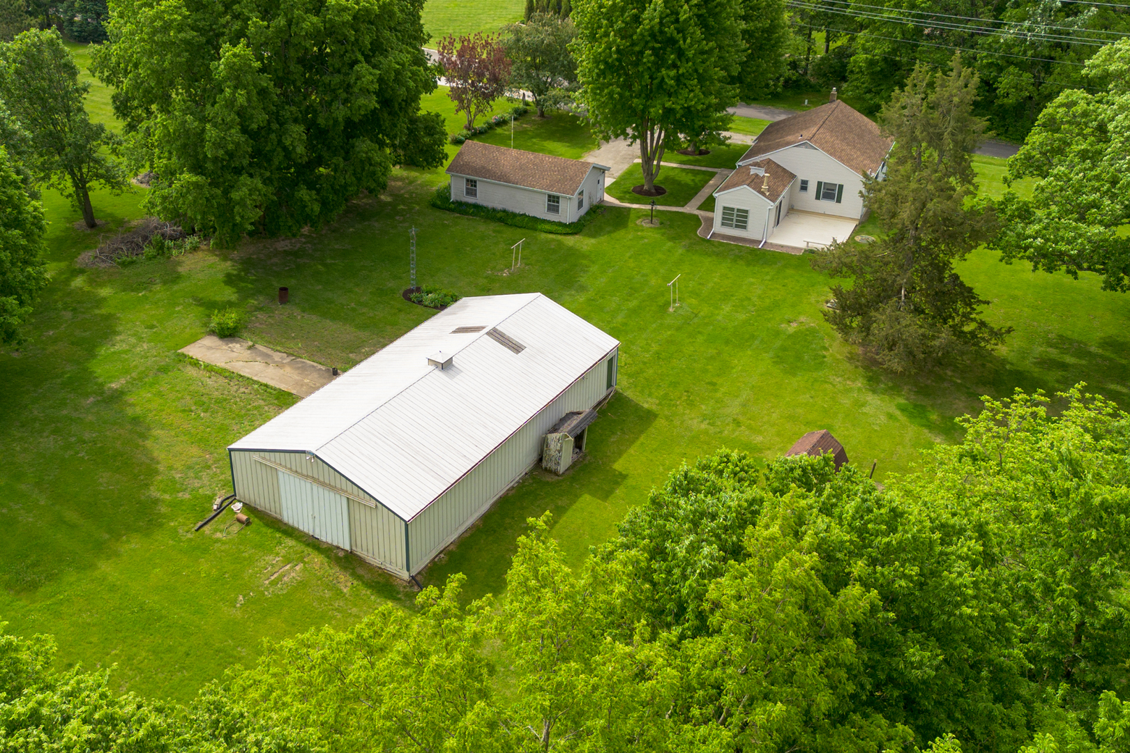 698 North 2853rd Road LaSalle, IL 61301 - Photo 2 of 39 an aerial view of a house with swimming pool garden and patio