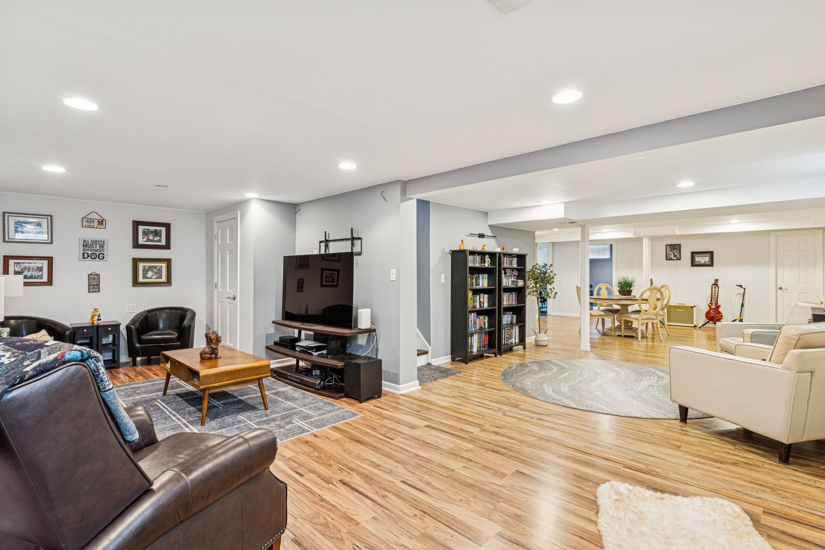 1341 Rose Boulevard Buffalo Grove, IL 60089 - Photo 15 of 19 a living room with furniture and a flat screen tv