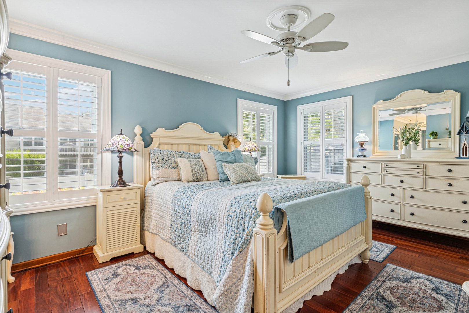 1341 Rose Boulevard Buffalo Grove, IL 60089 - Photo 6 of 19 a bedroom with a bed and a chandelier