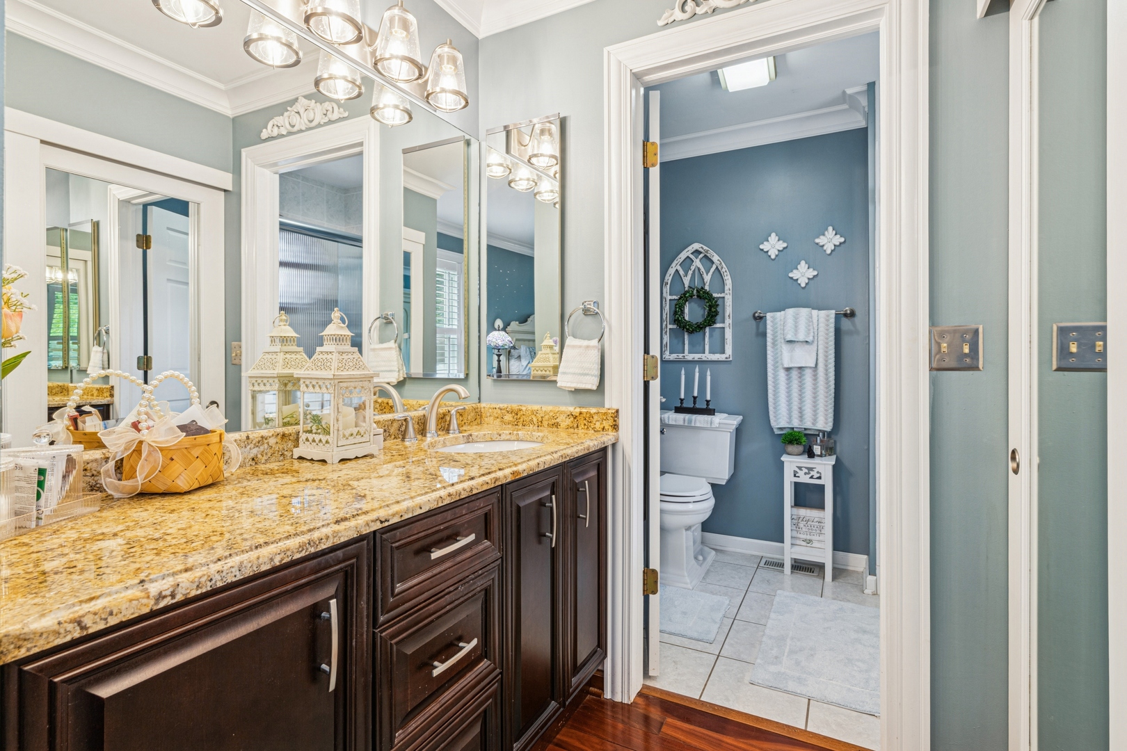 1341 Rose Boulevard Buffalo Grove, IL 60089 - Photo 8 of 19 a bathroom with a granite countertop sink a mirror and a shower