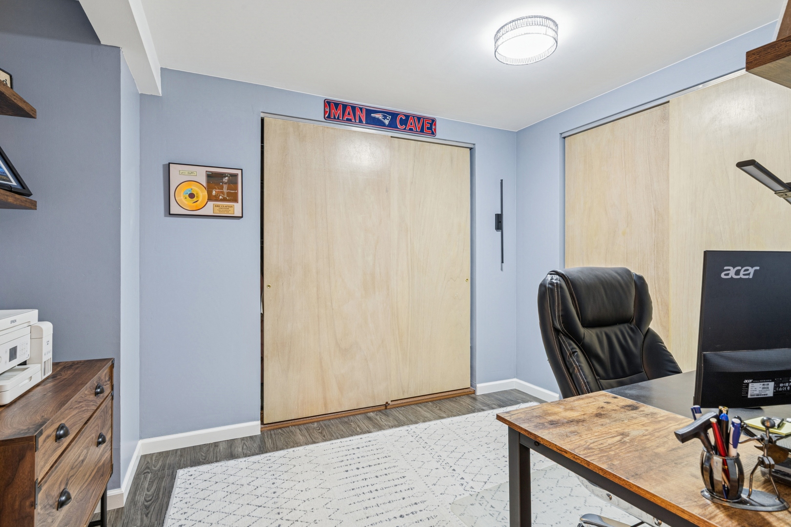 1341 Rose Boulevard Buffalo Grove, IL 60089 - Photo 9 of 19 a view of a workspace with furniture and wooden floor