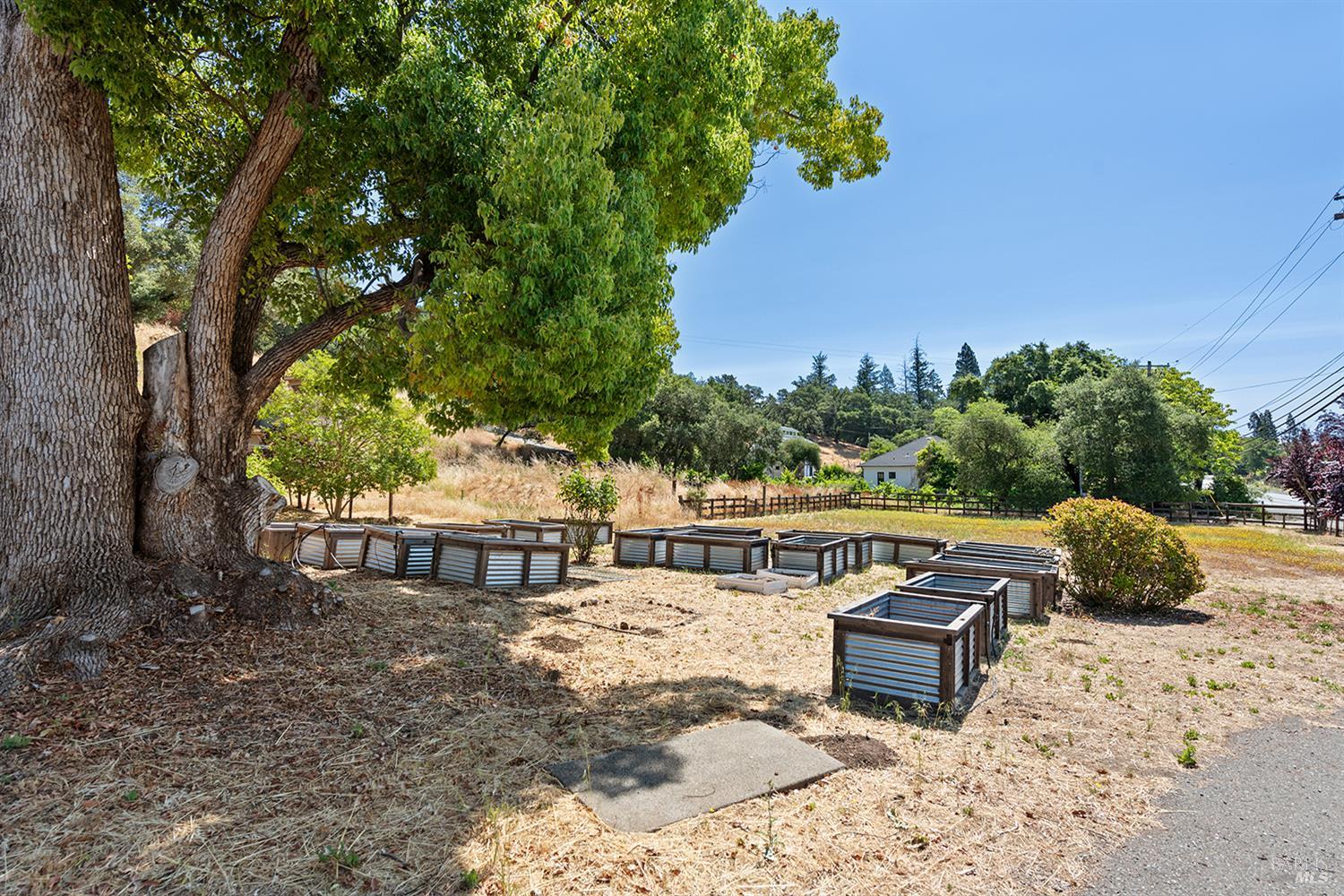 995 Dry Creek Road Healdsburg, CA 95448 - Photo 55 of 57 a view of a sitting area with furniture in a backyard