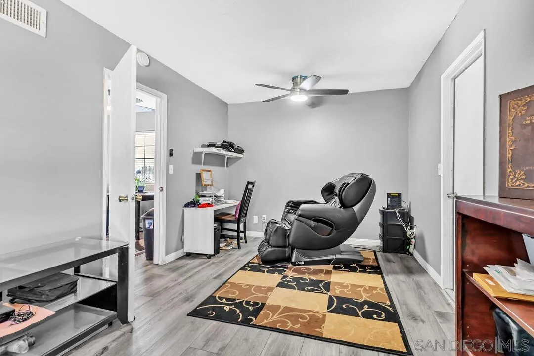 13611 Los Coches Road East El Cajon, CA 92021 - Photo 11 of 34 a living room with furniture and wooden floor