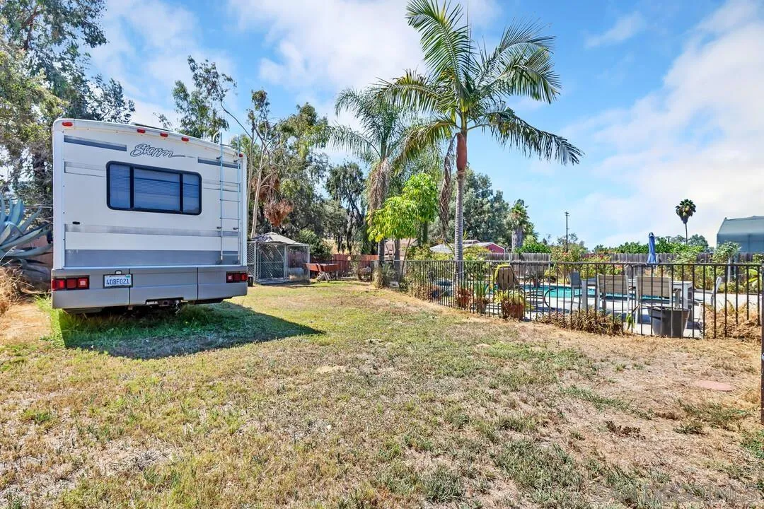 13611 Los Coches Road East El Cajon, CA 92021 - Photo 29 of 34 a view of a house with a yard