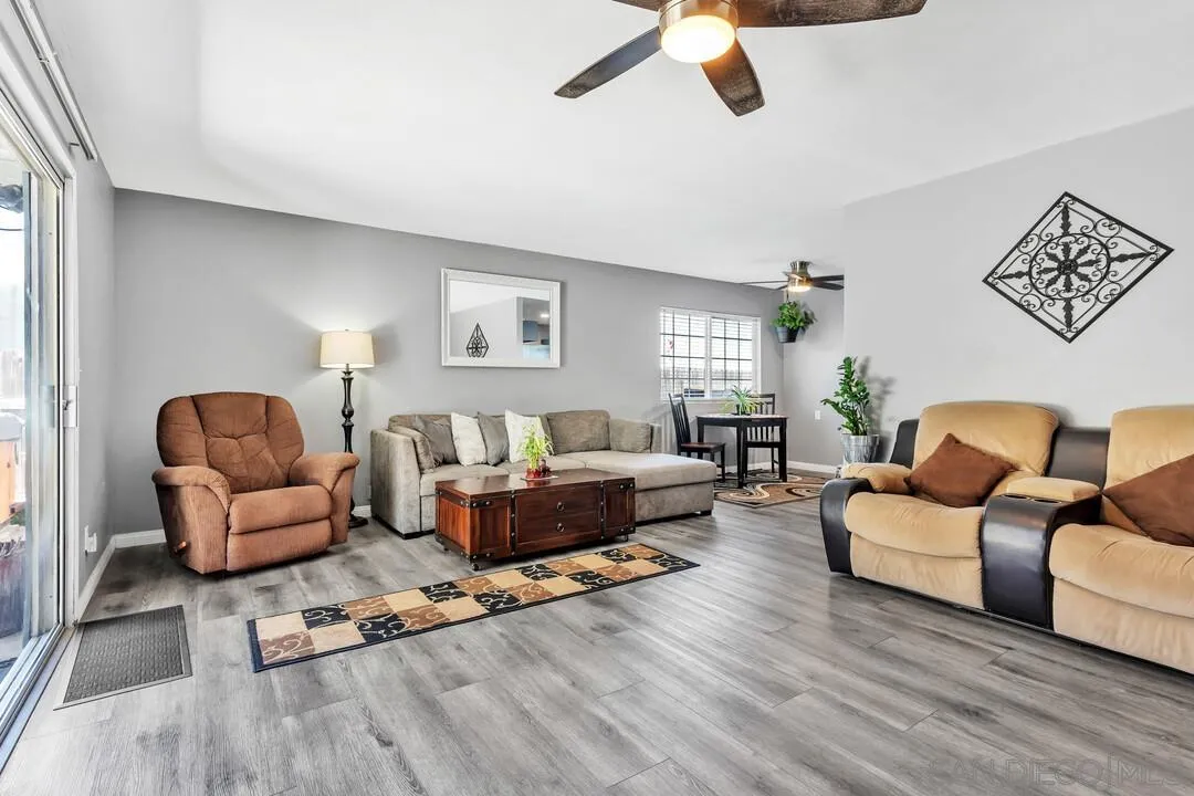 13611 Los Coches Road East El Cajon, CA 92021 - Photo 3 of 34 a living room with furniture rug and window
