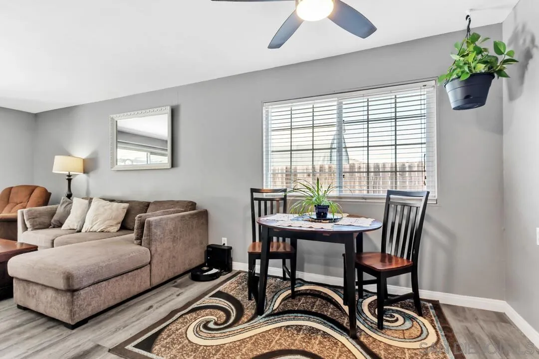 13611 Los Coches Road East El Cajon, CA 92021 - Photo 6 of 34 a living room with furniture and a potted plant