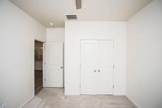 an empty room with closet