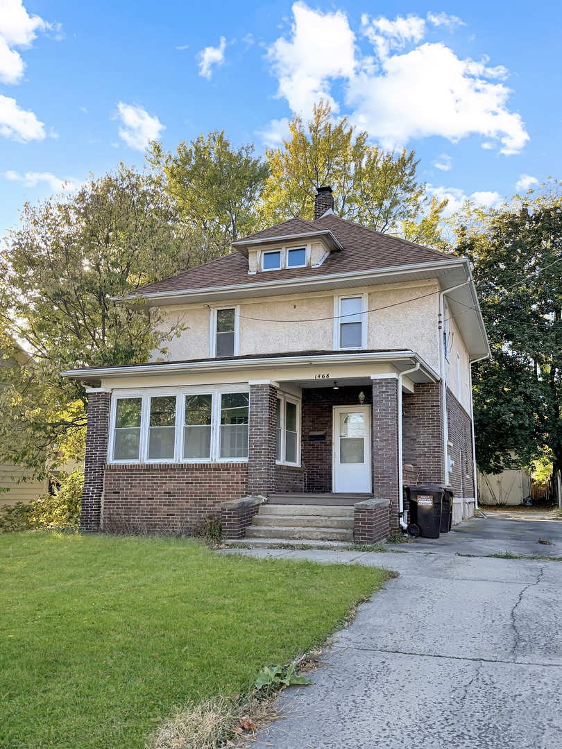 1468 South Float Avenue Freeport, IL 61032 - Photo 1 of 14 front view of a house with a yard