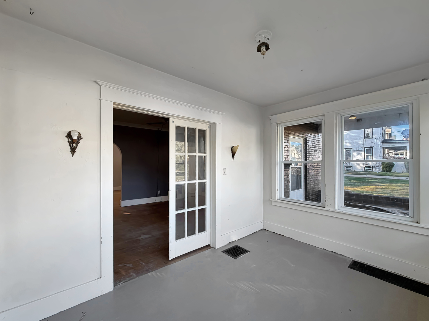 1468 South Float Avenue Freeport, IL 61032 - Photo 12 of 14 wooden floor and window in an empty room