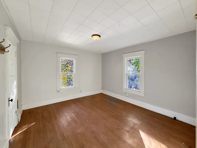 an empty room with windows