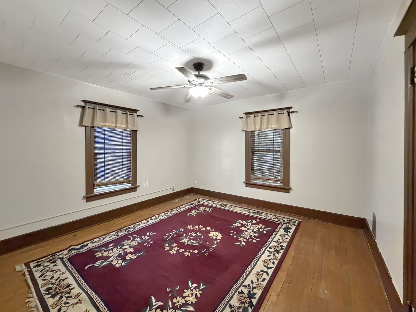 1468 South Float Avenue Freeport, IL 61032 - Photo 10 of 14 a view of an empty room with window and a rug