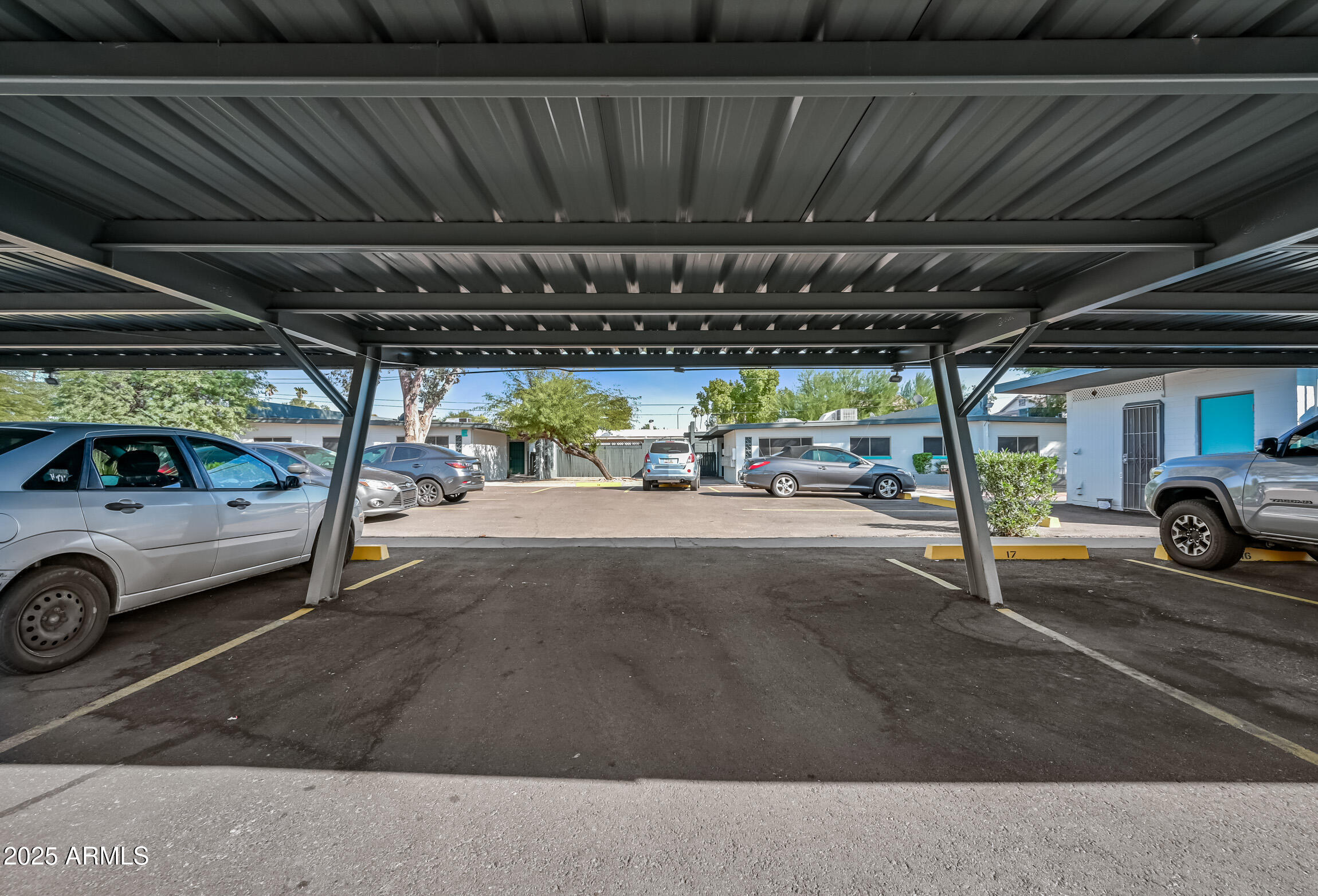1518 West Colter Street, Unit 4 Phoenix, AZ 85015 - Photo 26 of 26 a view of parking garage with cars