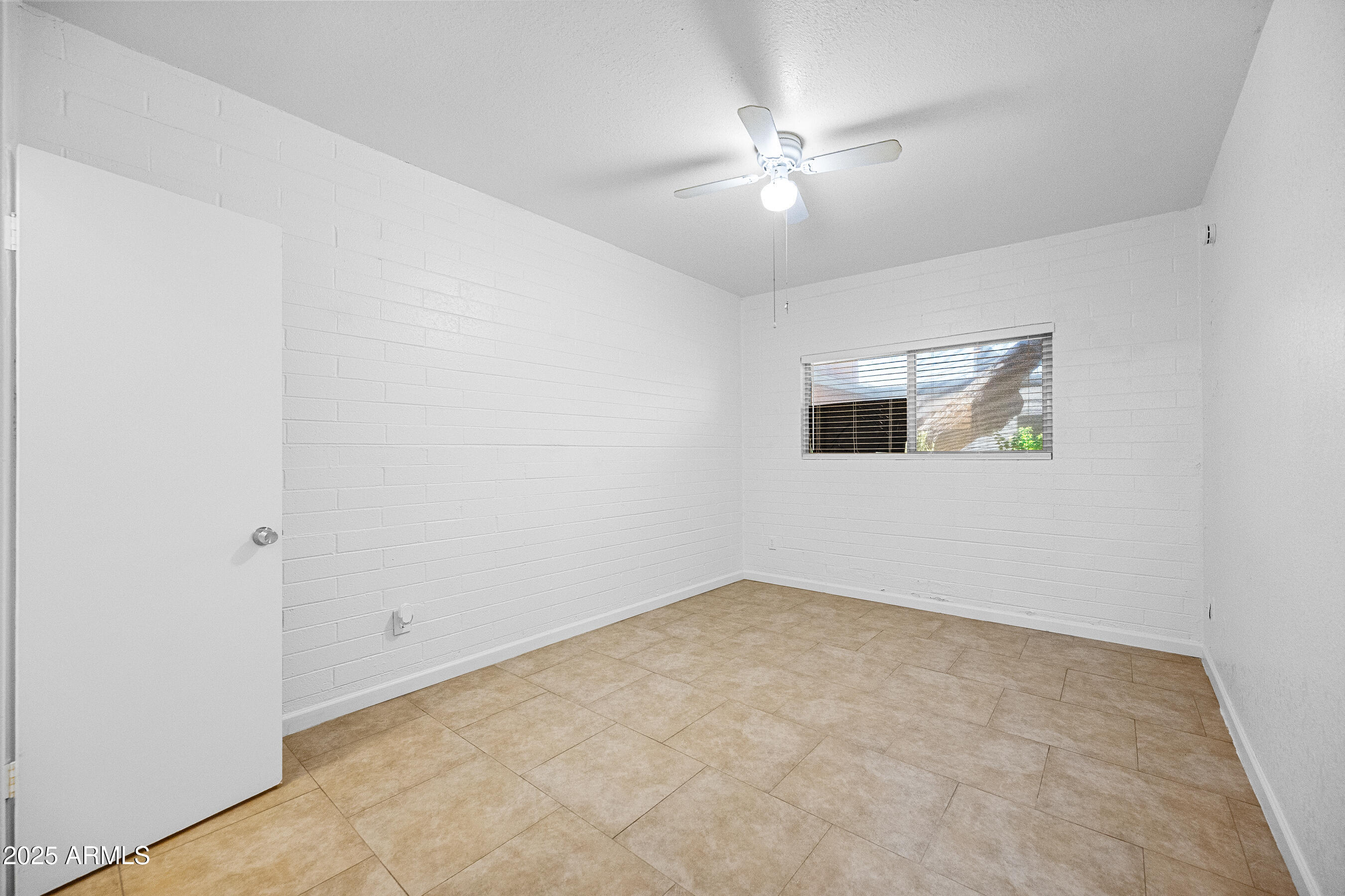 1518 West Colter Street, Unit 4 Phoenix, AZ 85015 - Photo 10 of 26 a view of an empty room