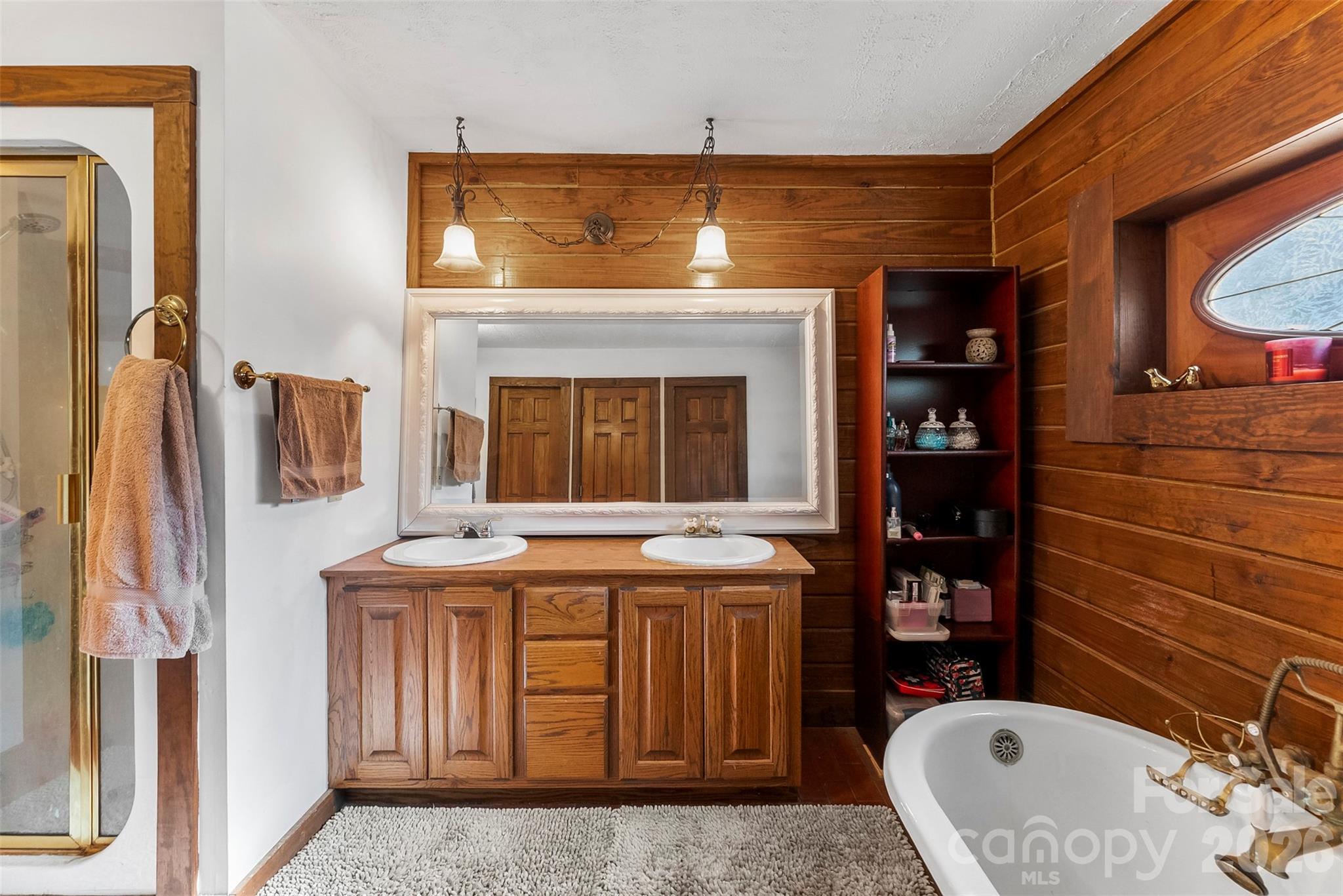 5011 Medlin Road Monroe, NC 28112 - Photo 13 of 37 a bathroom with a sink and a mirror